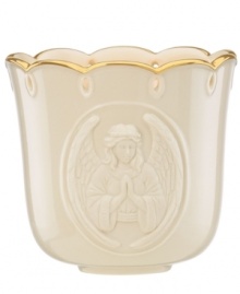 Add a glow to your home with this votive candle holder from Lenox, featuring an embossed angel with her hands clasped in prayer. With scalloped gold trim. Add a glow to your home with this votive candle holder from Lenox, featuring an embossed angel with her hands clasped in prayer. With scalloped gold trim.