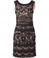 Luxurious dress in fine synthetic - From Australian designer Collette Dinnigan, known for her glamorous lace dresses - Elegant, nude dress covered with black French lace  - Feminine round neck d?collet? and wide straps, sleeveless - Glamorous embroidery - The top and skirt are cut slim and body-hugging in a classic pencil length - A dream of a dress, sexy and classy at the same time - Molds a nice, slender figure - Pair with black pumps or gladiator booties