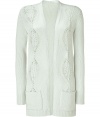 Channel trend-right style in this open cardigan from Theory - Open silhouette, long sleeves, front cable knit detail, two front pockets, slim fit, long body - Style with a flirty floral dress or belted with a silk blouse and slim flared jeans