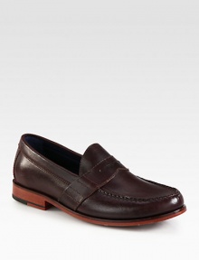 Classic penny loafer is handsewn and crafted in genuine leather with concealed Nike Air Technology in the heel for ultimate comfort and support.Leather upperLeather liningPadded insoleLeather/rubber soleImported