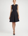 This timeless, impeccably tailored silhouette features an overlap bodice and a full, feminine skirt.Notched jewel necklineSleevelessOverlap bodiceInverted front pleatConcealed back zipFully linedAbout 23 from natural waist68% wool/32% polyesterDry cleanMade in France of imported fabricModel shown is 5'9½ (176cm) wearing US size 4. 