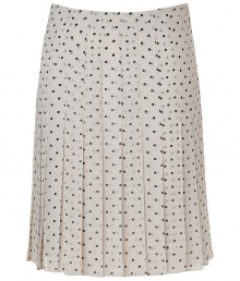 Elegant pleated skirt in fine ivory silk - Retro chic meets modern sophistication - On-trend black polka dot motif - Slim cut, hits at knees - Pleats swing lightly when walking - Polished, smart and sexy, ideal for work, cocktails and parties - Pair with a twin set or blazer and button down blouse, style with pumps or mules Elegant pleated skirt in fine ivory silk - Retro chic meets modern sophistication - On-trend black polka dot motif - Slim cut, hits at knees - Pleats swing lightly when walking - Polished, smart and sexy, ideal for work, cocktails and parties - Pair with a twin set or blazer and button down blouse, style with pumps or mules