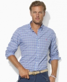 A handsome sport shirt is accented with Ralph Lauren's embroidered pony and tailored for a trim fit in plaid cotton broadcloth. A handsome sport shirt is accented with Ralph Lauren's embroidered pony and tailored for a trim fit in plaid cotton broadcloth.
