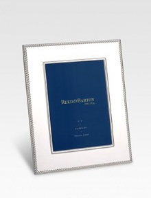 Elegant silverplate design with a beaded border and a mirror-bright shine. Outside 13½ X 11¼ Holds 8 x 10 photo Imported