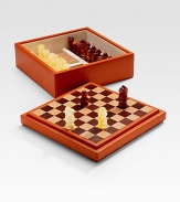 Become the king or queen of any party with a chess set handsomely crafted in leather-upholstered wood with an interlaced leather board. Set includes plastic chessmen and two blocknotes. From the Bugrane Collection 11¼W X 4½H X 11¼D Made in Italy