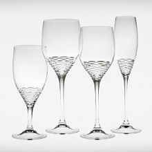 Renowned British fashion designer Jasper Conan introduces a new range of updated formal crystal stemware. In creating each stemware pattern, Mr. Conran brought his signature aesthetic mixing classic British elegance with a cheeky irreverent attitude. The horizontal cuts of the Rosette stemware pattern by Jasper Conran highlight the base of the vessel to resemble petals of the most delicate rose and will be perfect for your next toast. Renowned British fashion designer Jasper Conan introduces a new range of updated formal crystal stemware. In creating each stemware pattern, Mr. Conran brought his signature aesthetic mixing classic British elegance with a cheeky irreverent attitude. The horizontal cuts of the Rosette stemware pattern by Jasper Conran highlight the base of the vessel to resemble petals of the most delicate rose and will be perfect for your next toast.