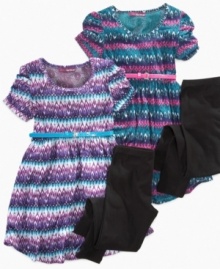 A long print dress from Epic Threads is highlighted with an adorable accessory belt and comfy leggings for a style that complements her sweet looks. A long print dress from Epic Threads is highlighted with an adorable accessory belt and comfy leggings for a style that complements her sweet looks.