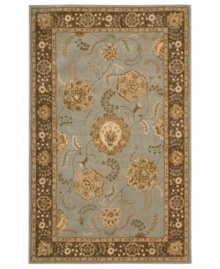 A muted blue field is accented with rich tones of beige and brown on this beautiful rug from Nourison. Incredibly soft New Zealand wool is tufted by hand and highlighted with pure silk for a truly majestic look and feel. A muted blue field is accented with rich tones of beige and brown on this beautiful rug from Nourison. Incredibly soft New Zealand wool is tufted by hand and highlighted with pure silk for a truly majestic look and feel.