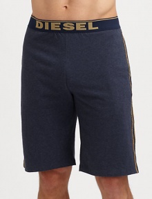 A casual elongated version with logo waistband and contrast piping. Elastic logo waistbandHits above kneeInseam, about 8CottonMachine washImported A casual elongated version with logo waistband and contrast piping. Elastic logo waistbandHits above kneeInseam, about 8CottonMachine washImported
