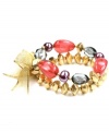 Unique and unexpected. A chic combination of gold, red, purple and grey beads yields an eclectic effect for Jones New York's double-row stretch bracelet. Crafted in gold tone mixed metal, the stretch design makes it comfortable and easy to wear. Item comes packaged in a signature gift box. Approximate diameter: 2-1/2 inches.