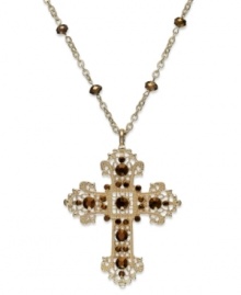 Demonstrate your faith with this elegant long necklace from Style&co. Displays an intricate cross pendant embellished with brown accents. Crafted in gold tone mixed metal. Approximate length: 36 inches. Approximate drop: 3-1/2 inches. Demonstrate your faith with this elegant long necklace from Style&co. Displays an intricate cross pendant embellished with brown accents. Crafted in gold tone mixed metal. Approximate length: 36 inches. Approximate drop: 3-1/2 inches.