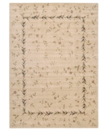 A beautiful lattice of delicate vines and blooming flowers gives this rug its magnetic charm. On a light beige ground with soft accents of red and blue, this densely woven piece invites you into wonderful interior decor. A beautiful lattice of delicate vines and blooming flowers gives this rug its magnetic charm. On a light beige ground with soft accents of red and blue, this densely woven piece invites you into wonderful interior decor.