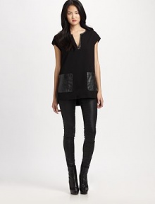 Try to resist this twill tunic with fashion-forward leather pockets and a relaxed-yet-flattering fit.V-necklineCap sleevesLeather patch pocketsAbout 28 from shoulder to hemBody: 75% viscose/21% nylon/4% elastanePockets: lambskin leatherDry clean by leather specialistImported Model shown is 5'9 (175cm) wearing US size Small. Try to resist this twill tunic with fashion-forward leather pockets and a relaxed-yet-flattering fit.V-necklineCap sleevesLeather patch pocketsAbout 28 from shoulder to hemBody: 75% viscose/21% nylon/4% elastanePockets: lambskin leatherDry clean by leather specialistImported Model shown is 5'9 (175cm) wearing US size Small.