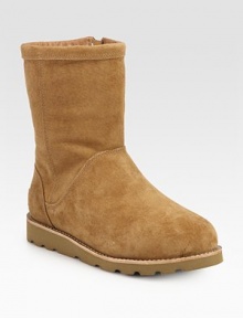 Buttery suede forms this go-to boot lined in shearling for superior comfort. Shaft, 8½Leg circumference, 14Suede upperSide zipShearling liningRubber trek solePadded insoleImported