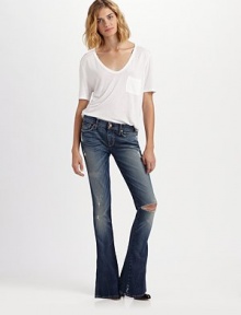 Slim-fitting stretch denims with all the broken-in details you love, including tears, whiskers and fading.THE FITFitted through hips and thighsMedium rise, about 8Inseam, about 35THE DETAILSZip flyFive-pocket style98% cotton/2% spandexMachine washMade in USA of imported fabricModel shown is 5'10 (177cm) wearing US size 4. Slim-fitting stretch denims with all the broken-in details you love, including tears, whiskers and fading.THE FITFitted through hips and thighsMedium rise, about 8Inseam, about 35THE DETAILSZip flyFive-pocket style98% cotton/2% spandexMachine washMade in USA of imported fabricModel shown is 5'10 (177cm) wearing US size 4.