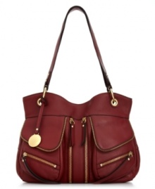 Make a serious style statement with this ultra-chic tote from Franco Sarto. Luxe leather is outfitted with eye-catching zipper details and posh golden hardware, while the roomy interior lets you take along all your everyday must-haves. Make a serious style statement with this ultra-chic tote from Franco Sarto. Luxe leather is outfitted with eye-catching zipper details and posh golden hardware, while the roomy interior lets you take along all your everyday must-haves.