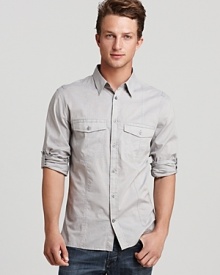 Featuring a double pocket design, this understated shirt from John Varvatos Star USA makes a great choice for casual dinner plans and relaxed parties. Featuring a double pocket design, this understated shirt from John Varvatos Star USA makes a great choice for casual dinner plans and relaxed parties.