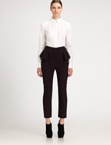 A sculptural ruffled peplum elevates this cropped, artfully tailored wool style.Zip flyRuffled peplumInseam, about 25WoolDry cleanMade in Italy of imported fabricModel shown is 5'11 (180cm) wearing US size 4. 