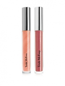 Turn heads with Trish's luminous, long-wearing gloss formulation, designed to enhance your pout with an enticing marriage of high-shine and brilliant points of light for a mirror effect that creates the illusion of fuller lips. This irresistible duo includes complementing pale Petal and punchy Pink, different shades for your different moods. Turn heads with Trish's luminous, long-wearing gloss formulation, designed to enhance your pout with an enticing marriage of high-shine and brilliant points of light for a mirror effect that creates the illusion of fuller lips. This irresistible duo includes complementing pale Petal and punchy Pink, different shades for your different moods.