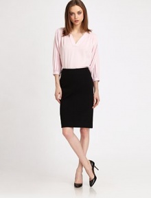 High-waisted pencil silhouette of stretch twill, with a back adjustable slit for added versatility. Slim silhouetteHigh-rise waistVertical seamBack slit at hemBack zip/hook-and-bar closureBack zipper at hemAbout 22 from natural waist71% viscose/23% polyamide/6% elastaneDry cleanImportedModel shown is 5'9 (175cm) wearing US size 4. High-waisted pencil silhouette of stretch twill, with a back adjustable slit for added versatility. Slim silhouetteHigh-rise waistVertical seamBack slit at hemBack zip/hook-and-bar closureBack zipper at hemAbout 22 from natural waist71% viscose/23% polyamide/6% elastaneDry cleanImportedModel shown is 5'9 (175cm) wearing US size 4.