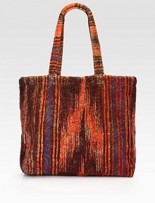 A distinctive ikat design printed on plush cotton terry is remarkably rich, despite its easy practicality and durability.Double shoulder strapsInside open pocketsCotton18W X 15H X 4DMachine washMade in USA A distinctive ikat design printed on plush cotton terry is remarkably rich, despite its easy practicality and durability.Double shoulder strapsInside open pocketsCotton18W X 15H X 4DMachine washMade in USA