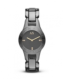 This Armani Exchange timepiece is sleekly polish in darkened stainless steel embellished with Swarovski crystals. This Armani Exchange timepiece is sleekly polish in darkened stainless steel embellished with Swarovski crystals.