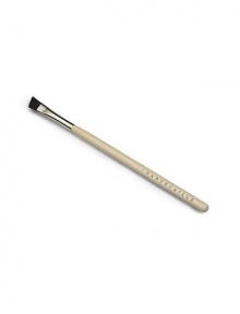 A small, soft angled brush to shape eyebrows, made of boar bristle. A small, soft angled brush to shape eyebrows, made of boar bristle.