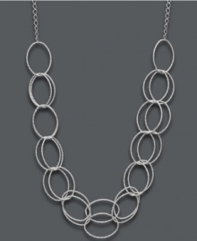 Add a subtle touch of glitter and glitz. Giani Bernini's intricate, diamond-cut double layer necklace lends a trendy touch to your look. Crafted in sterling silver. Approximate length: 20 inches.