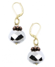 Multi-faceted style. The perfect blend of silver, gold and bronze tone mixed metal beads and accents comprise Jones New York's single drop earrings. Approximate drop: 1 inch. Multi-faceted style. The perfect blend of silver, gold and bronze tone mixed metal beads and accents comprise Jones New York's single drop earrings. Approximate drop: 1 inch.