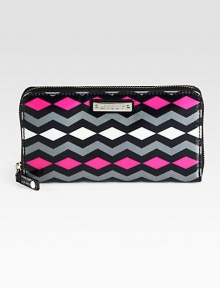 Ultra-protective coated fabric takes on a retro-inspired print in bold hues. Zip-around closureOne inside zip pocketTwo bill compartmentsTwelve credit card slotsFully lined7½W X 4½H X 1DImported Ultra-protective coated fabric takes on a retro-inspired print in bold hues. Zip-around closureOne inside zip pocketTwo bill compartmentsTwelve credit card slotsFully lined7½W X 4½H X 1DImported