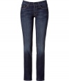 Super flattering blue washed Roxanne classic skinny jeans from Seven for All Mankind - These chic jeans are versatile and easy to stylea perfect staple for any wardrobe - Classic five-pocket styling, slim silhouette, subtle whiskering detail - Distinctive squiggle logo on back pockets - Style with an oversized pullover, a slim trench, and wedge booties