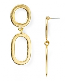 Strike gold with these hammered disc earrings from Kenneth Jay Lane. With delicate open hoops, this pair ensures your status as a golden girl.