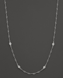 White sapphires sparkle on this intricate sterling silver necklace from Judith Ripka.