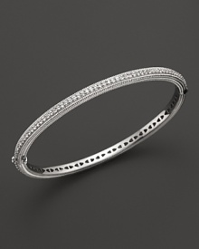 White sapphires stud a sterling silver bangle from Judith Ripka.