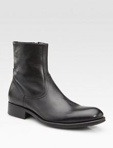 Superb craftsmanship with a handmade touch, designed in hand-burnished leather with a side zip for easy on and off. Leather lining Padded insole Leather/rubber sole Made in Italy Superb craftsmanship with a handmade touch, designed in hand-burnished leather with a side zip for easy on and off. Leather lining Padded insole Leather/rubber sole Made in Italy