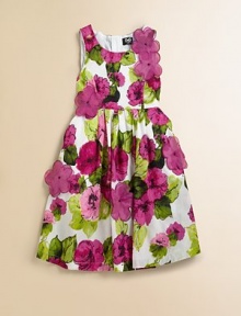 A lush, vivid floral print on pure cotton is sprinkled with sheer layered flowers adding rich dimension.Scoop necklineSleevelessSewn waistFull pleated skirtBold back zipperFully linedCottonDry cleanImported