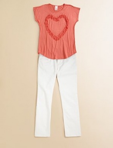 A casual knit is gets a groovy update with fringe heart detail and a round hem.CrewneckShort sleevesRound hem96% rayon/4% spandexDry cleanMade in the USA of imported fabric A casual knit is gets a groovy update with fringe heart detail and a round hem.CrewneckShort sleevesRound hem96% rayon/4% spandexDry cleanMade in the USA of imported fabric
