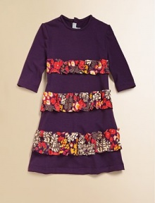 Colorful floral ruffled stripes accents this A-line frock.Crewneck Back button closureThree-quarter sleevesCottonHand washImported Colorful floral ruffled stripes accents this A-line frock.Crewneck Back button closureThree-quarter sleevesCottonHand washImported