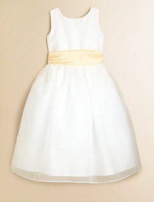 A sleeveless masterpiece for her special moments, designed in pretty organza with a full skirt and contrasting sash at the waist. Built-in slip with crinolineNatural waist with sashBack button closureTea lengthFully linedPolyesterHand washImported A sleeveless masterpiece for her special moments, designed in pretty organza with a full skirt and contrasting sash at the waist. Built-in slip with crinolineNatural waist with sashBack button closureTea lengthFully linedPolyesterHand washImported