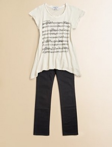 She'll sing her praises for this cozy cotton v-neck with sheet music screen print.V-neckShort sleevesPullover styleAsymmetrical hemCottonMachine washMade in the USA She'll sing her praises for this cozy cotton v-neck with sheet music screen print.V-neckShort sleevesPullover styleAsymmetrical hemCottonMachine washMade in the USA