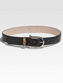 A graceful golden horsebit with a bamboo keeper on a pebble-textured leather strap.Width, about 1½Made in Italy A graceful golden horsebit with a bamboo keeper on a pebble-textured leather strap.Width, about 1½Made in Italy