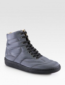 Durable quilted fabric with a hint of sheen forms this lace-up staple with intricately-stitched details. Quilted fabric upperLeather liningRubber solePadded insoleMade in Italy