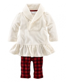 Paired with eye-popping plaid leggings, plush velour is given a truly girly makeover with a sparkling rhinestone button, puffed sleeves and ruffled hem. Paired with eye-popping plaid leggings, plush velour is given a truly girly makeover with a sparkling rhinestone button, puffed sleeves and ruffled hem.