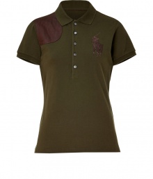 An ultra luxe take on the iconic polo, this leather detailed version from Polo Ralph Lauren lends a chic edge to your outfit, no matter how you wear it - Cutaway collar, short sleeves, partial button-down front, oversized leather polo logo and shoulder patch, side slits, longer back - Form-fitting - Team with tweed blazers, jeans, and slipper-style loafers