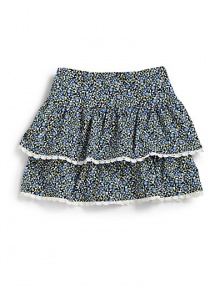 THE LOOKElasticized waistTiered ruffled skirtInterior shortsTHE MATERIAL95% cotton/5% spandexCARE & ORIGINMachine washImported THE LOOKElasticized waistTiered ruffled skirtInterior shortsTHE MATERIAL95% cotton/5% spandexCARE & ORIGINMachine washImported