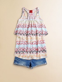 A colorful zig-zag print and v-shaped, layered look waist add a zing to this knit tunic.ScoopneckSleeveless racerbackLayered-look waistRounded hemRayonHand washImported A colorful zig-zag print and v-shaped, layered look waist add a zing to this knit tunic.ScoopneckSleeveless racerbackLayered-look waistRounded hemRayonHand washImported