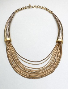 This unique statement piece features a mix of link and snake chains in a multi-row style with textured, horn-shaped endcaps. Antique-finished goldtoneLength, about 17Lobster clasp closureImported This unique statement piece features a mix of link and snake chains in a multi-row style with textured, horn-shaped endcaps. Antique-finished goldtoneLength, about 17Lobster clasp closureImported