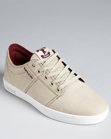 A fresh pair of kicks always makes a difference, and these laid-back sneakers from Supra contrast colors for a cool new design. A fresh pair of kicks always makes a difference, and these laid-back sneakers from Supra contrast colors for a cool new design.