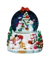 When it comes to snow, the more the merrier. A happy family gathers around this festive snow globe, sledding down a hill and decorating a tree. With shimmering glitter from top to bottom, it's a surefire favorite from Christopher Radko.