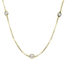 Glamour for miles. CRISLU's luxurious long necklace features bezel-set, round-cut cubic zirconias (3-1/4 ct. t.w.) strung from a delicate chain. Crafted in 18k gold over sterling silver. Approximate length: 36 inches + 2-inch extender.